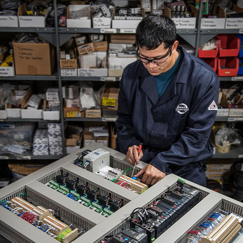 Technician Building Custom Control Panel
